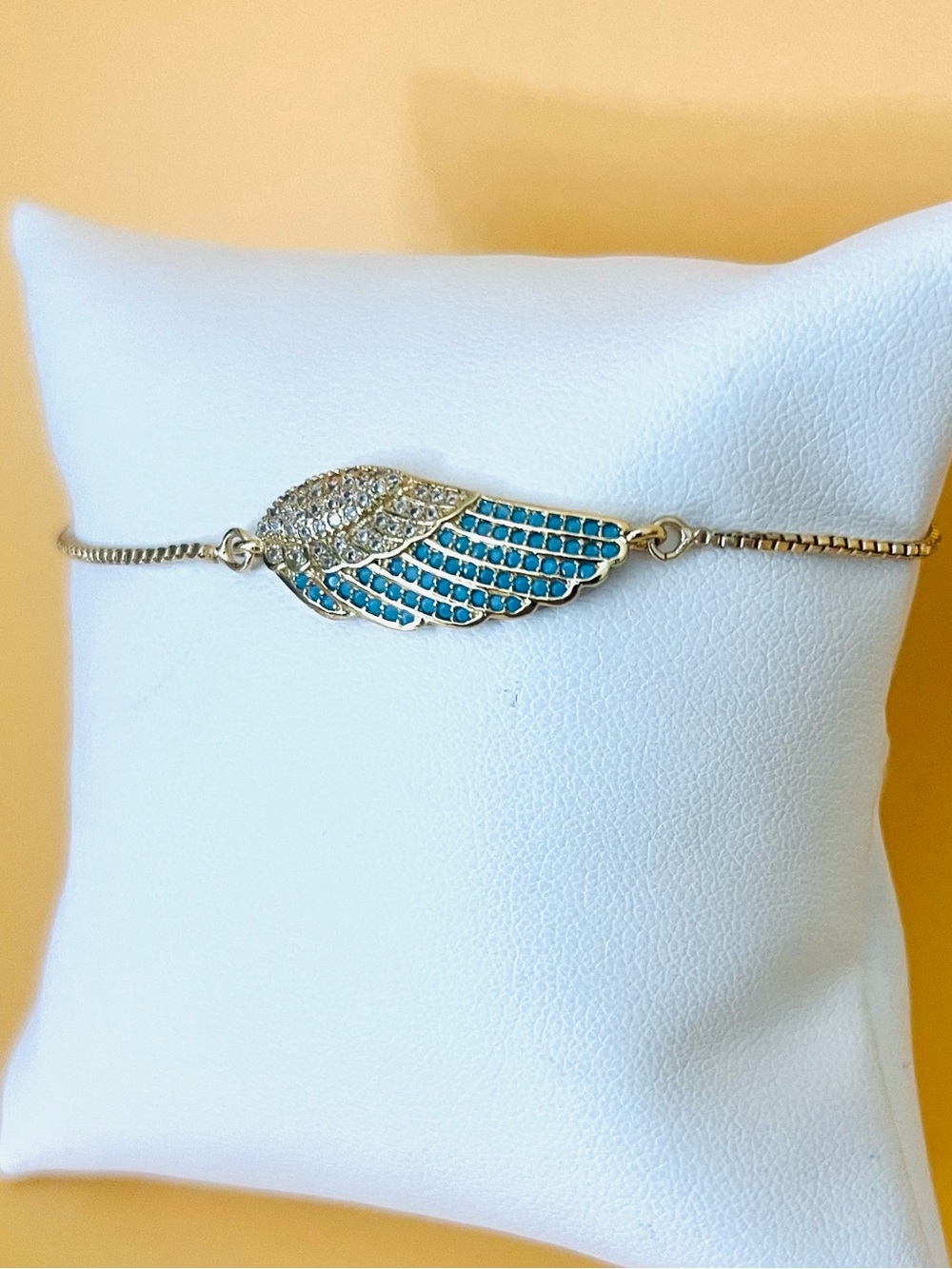 14K GP paved Angel wing Bracelet blue & clear CZ adjustable size